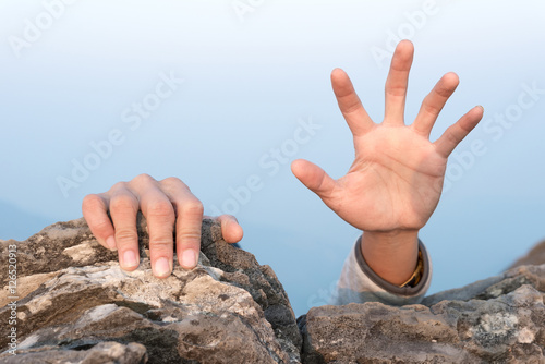 hands for help rock climbing photo