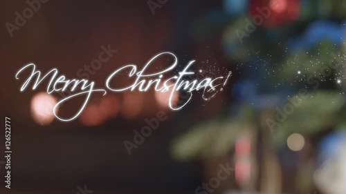 Merry Christmas  particle text on fireplace background