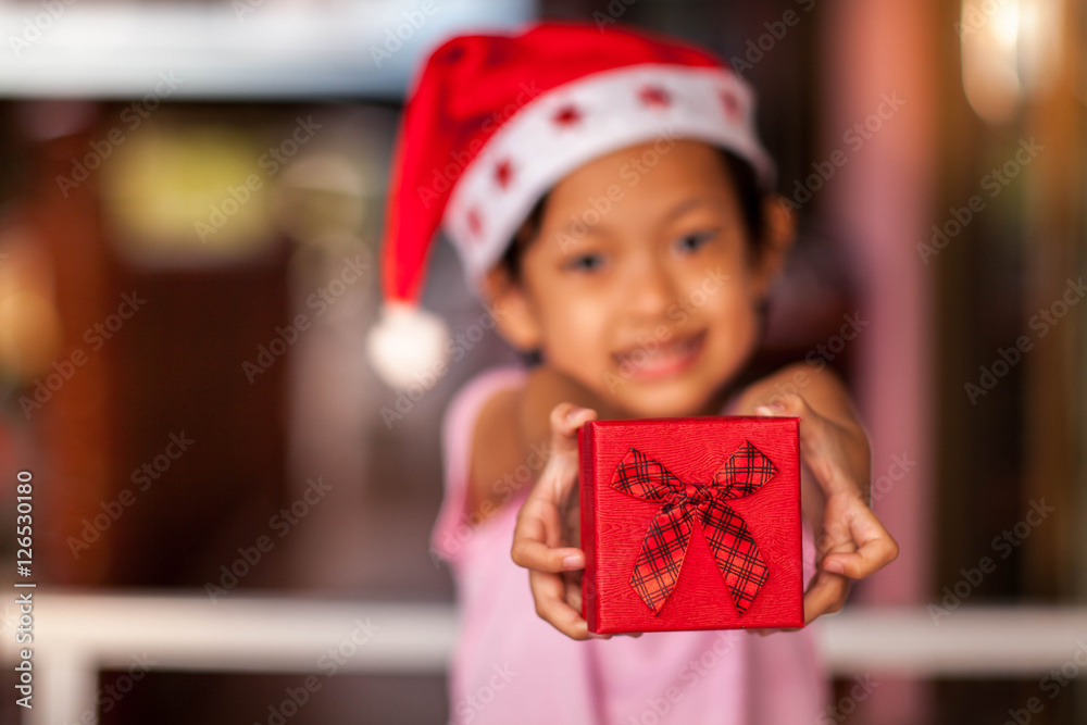 Child give gifts with in christmas or Xmas celebration. Child give gifts with in christmas or Xmas celebration.
