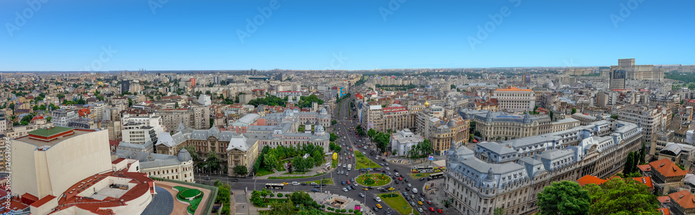 180 Degrees aerial panorama of the capital city of Romania, Bucharest. Blue sky above the center of the city.