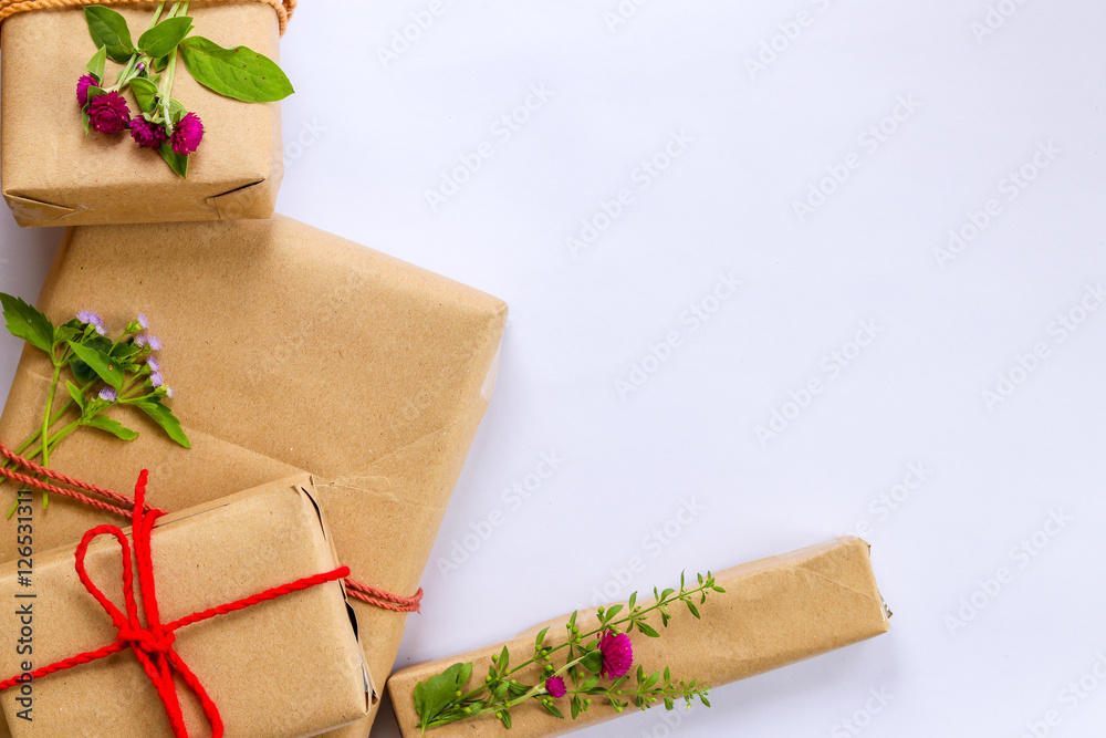 craft cardboard gift boxes with flowers on  white background  