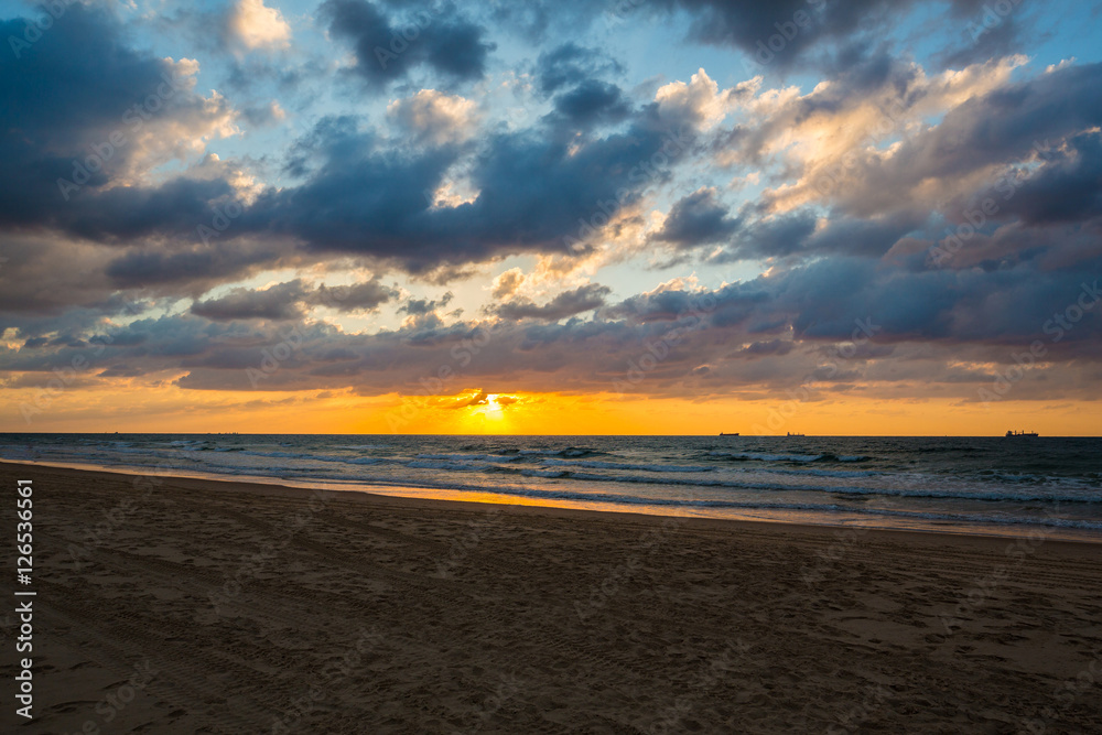 sea waves on the sunset background sea waves on the sunset background