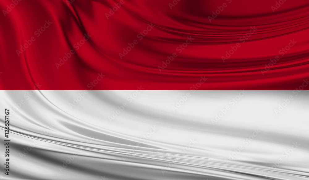 Naklejka premium National waving flag of Monaco on a silk drape