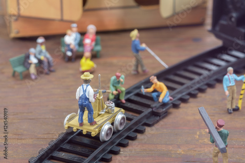 Wallpaper Mural Construction toy / View of construction site of mini toy worker on wood background. Torontodigital.ca