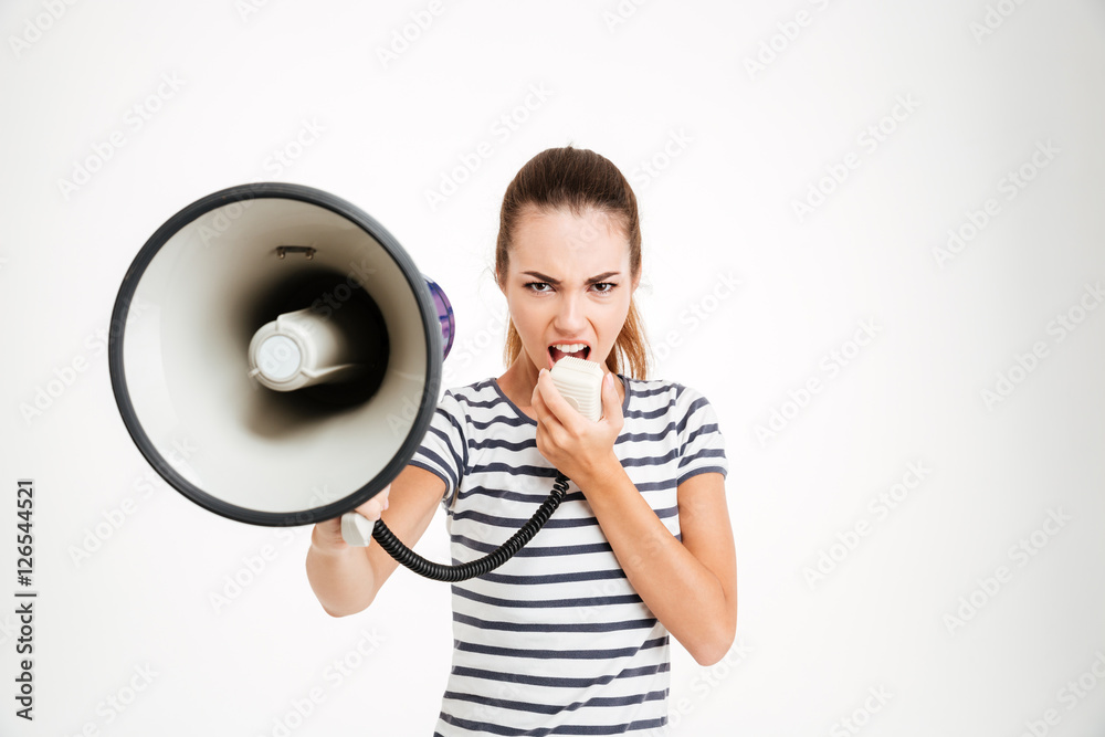 Beautiful woman shouting into megaphone Beautiful woman shouting into megaphone