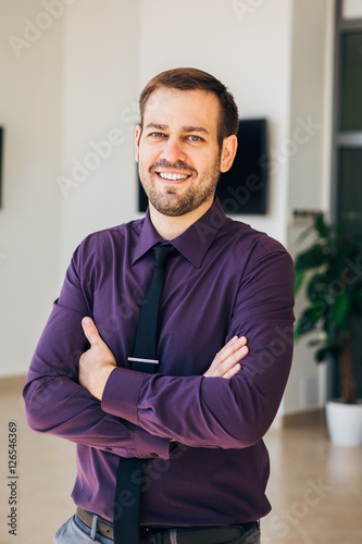portrait of a businessman in  purple shirt