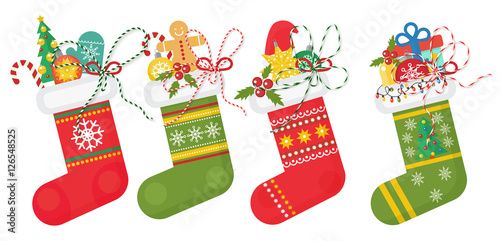 Set of vector Christmas socks in red andd green colors with various patterns. Christmas stocking collection.