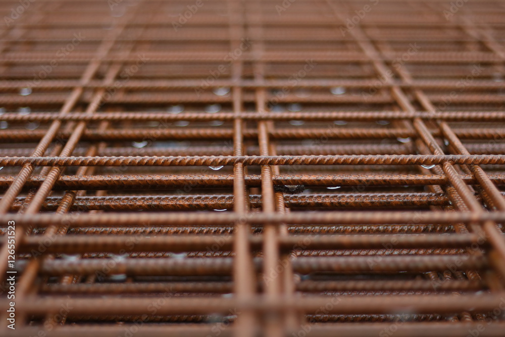 Reinforcing steel mesh, close up image of construction material Reinforcing steel mesh, close up image of construction material