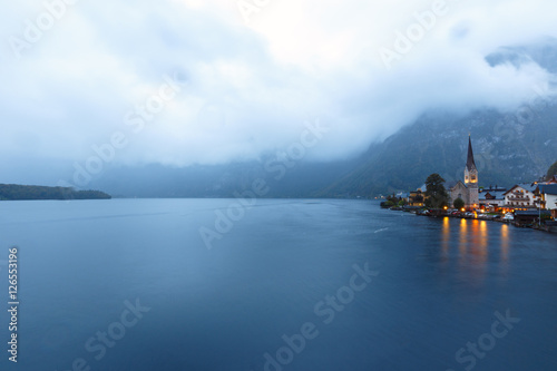 Little famous Hallstatt village in Alps at dusk in Austria