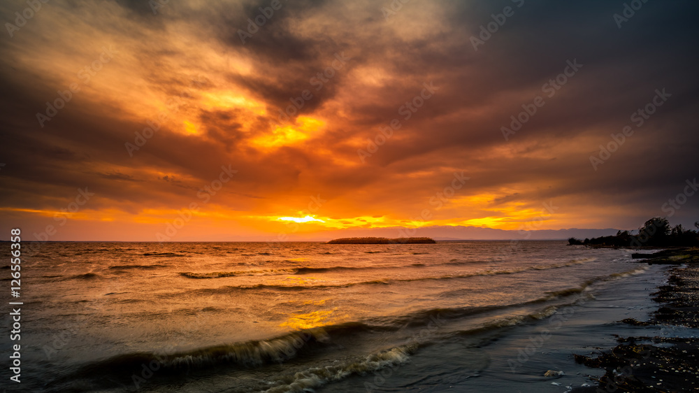 Colorful sky and water in lake Paliastomi in morning time before Colorful sky and water in lake Paliastomi in morning time before