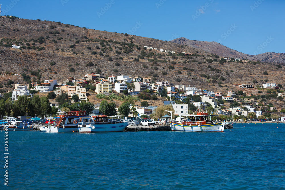 Touristic ships in a port of Elounda city, Greece