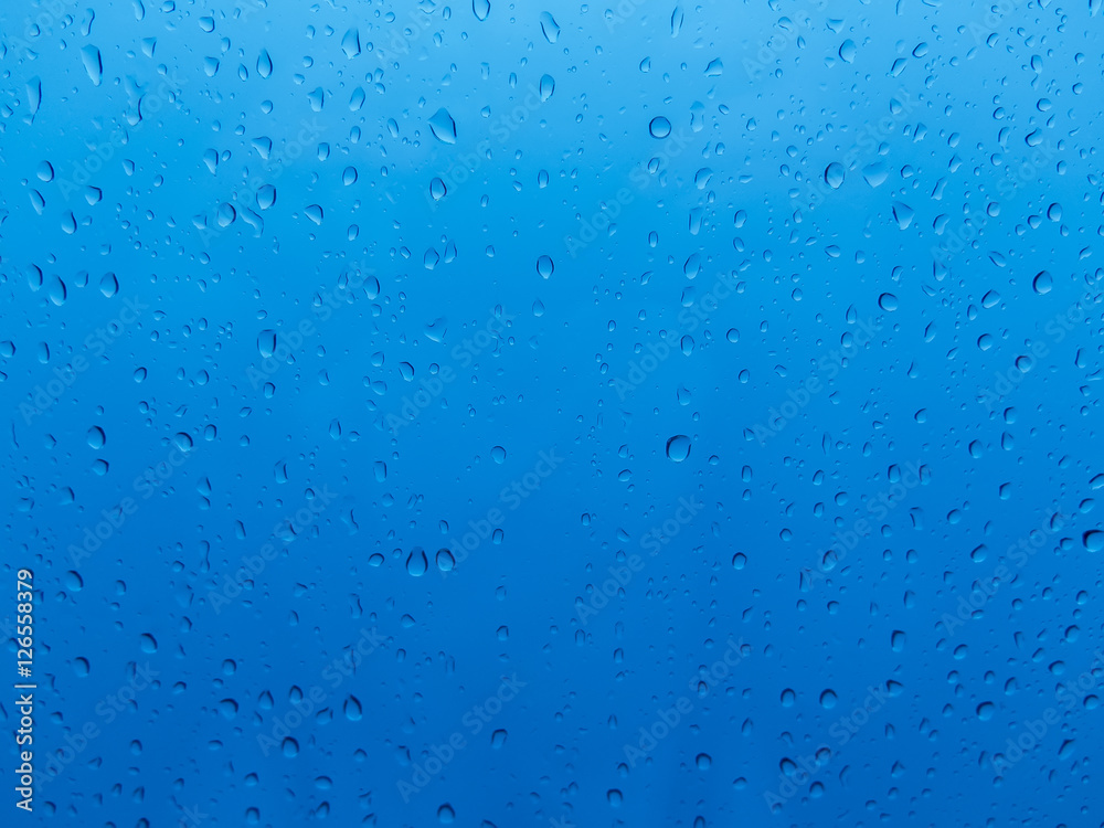 Water drops over blue