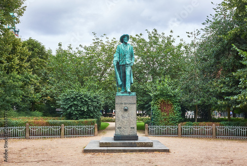 Statue of the danish writer and poet Holger Drachmann, standing in a small park on Alle Gade on Frederiksberg Denmark