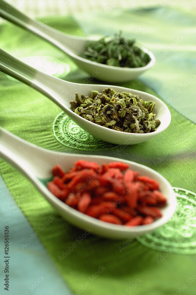 Still life of Chinese spoons with spices in a row Still life of Chinese spoons with spices in a row