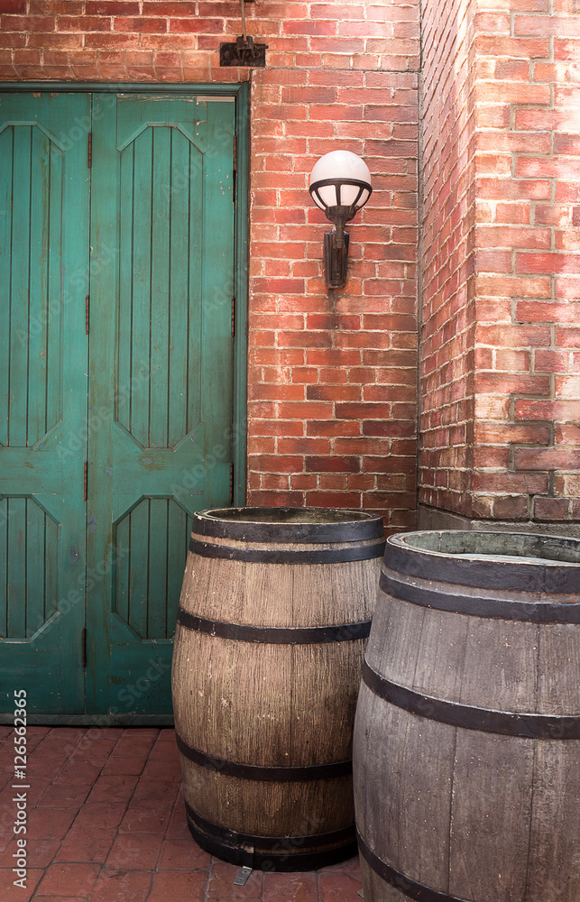 oak barrel with brickwall background oak barrel with brickwall background