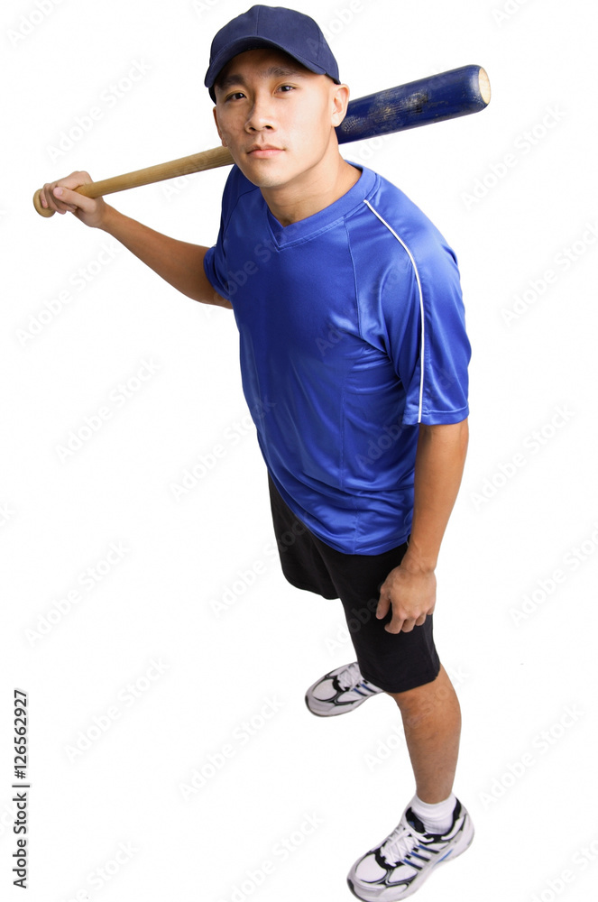 Young man holding baseball bat, looking up at camera Stock Photo | Adobe  Stock