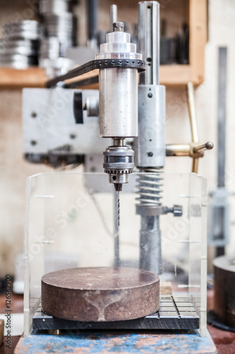 drilling machine in jeweler s workroom