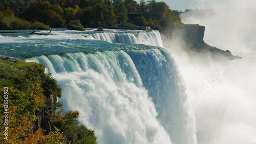 The famous waterfall Niagara Falls, a popular spot among tourists from all over the world. The view from the American side. In the picture, one can see at once two waterfalls ProRes HQ 422 10 bit photo