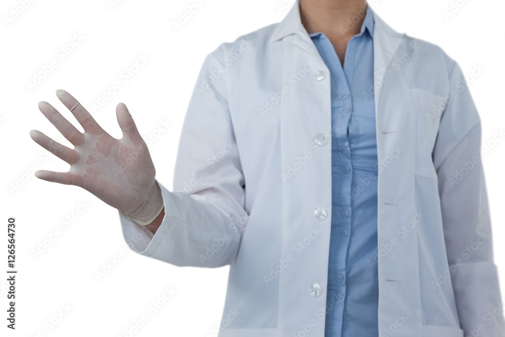 Mid-section of female doctor using digital screen Mid-section of female doctor using digital screen