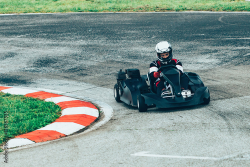 Go carting. Woman in racing track