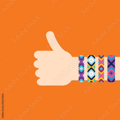 Hitchhiking hand with hippy friendship bracelets. Thumb up sign