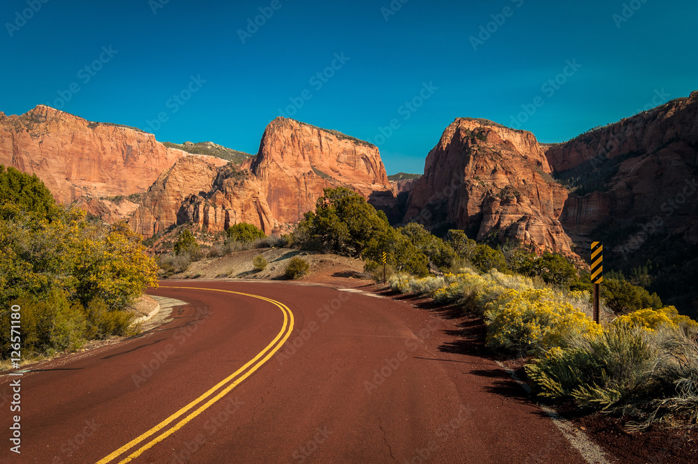 Riding on an open road winding through Southwest America Riding on an open road winding through Southwest America