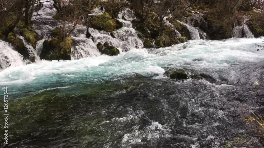 Pearl Shoal Waterfall at Jiuzhaigou National Park where is the UNESCO World Heritage in Sichuan , China in Autumn in November located in in Tibetan-Qiang of Sichuan ,China Pearl Shoal Waterfall at Jiuzhaigou National Park where is the UNESCO World Heritage in Sichuan , China in Autumn in November located in in Tibetan-Qiang of Sichuan ,China