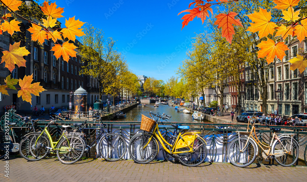 Bikes on the bridge in  Amsterdam, Netherlands. Canals of Amsterdam