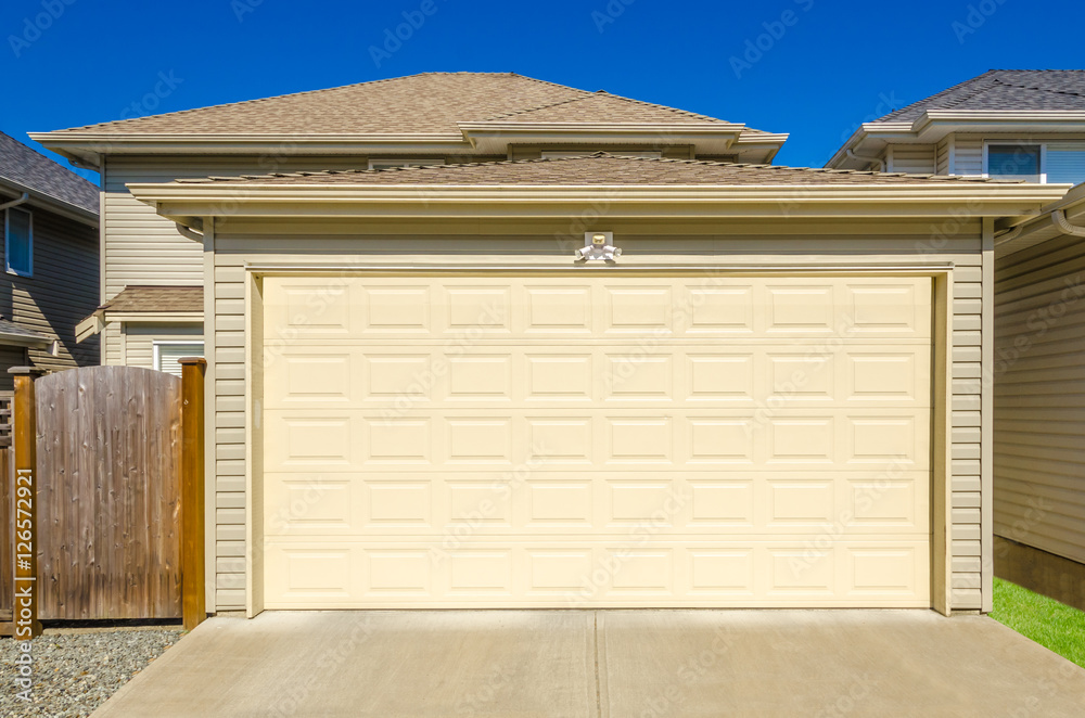 Fototapeta premium Fragment of a luxury house with a garage door in Vancouver, Canada.
