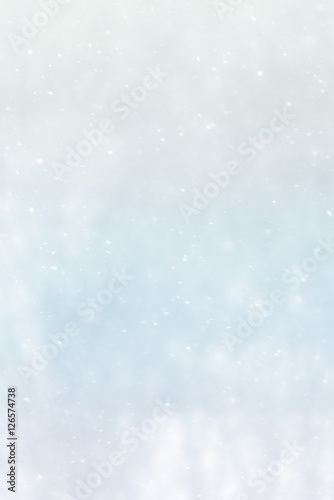 Winter blur background with snowflakes © dvoevnore