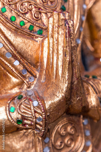 Details from buddha statue - namaskara