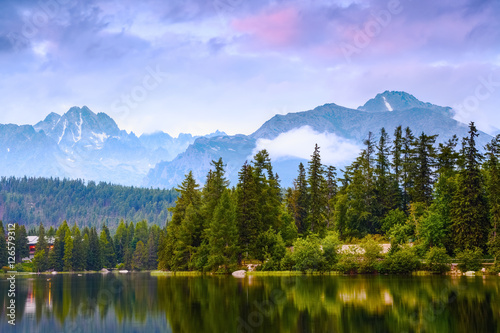 Fototapeta Naklejka Na Ścianę i Meble -  Calm lake, fantastic mountains and sky.