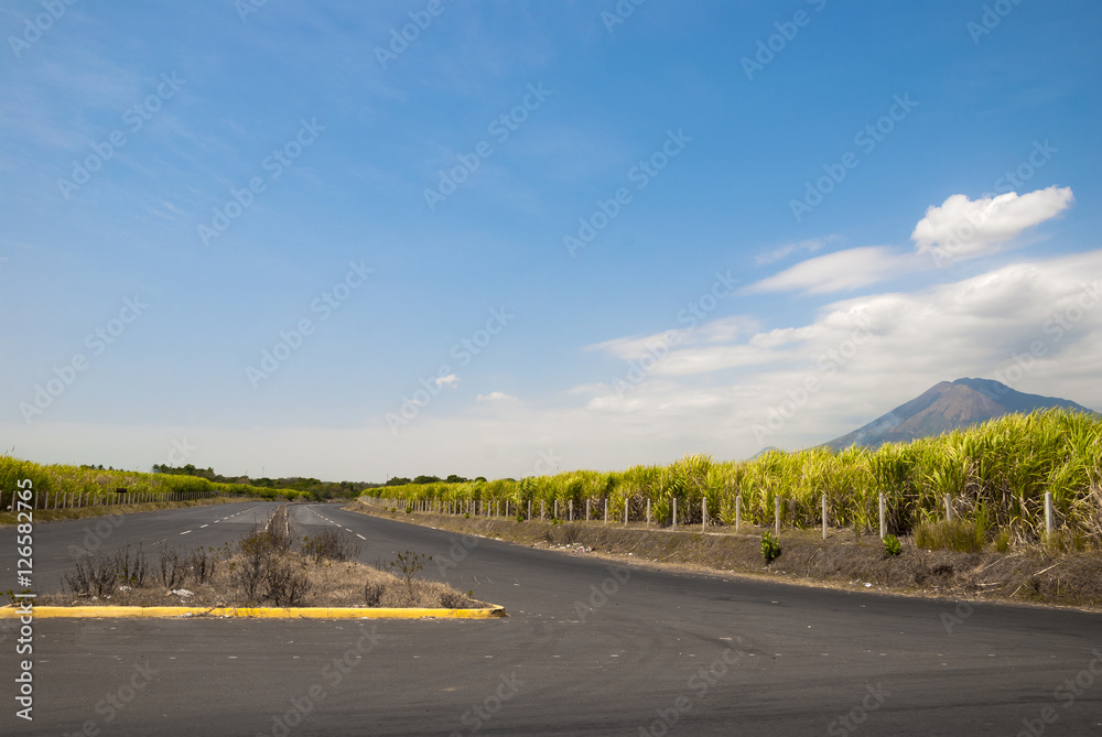 Empty curved road with blue sky El Salvador