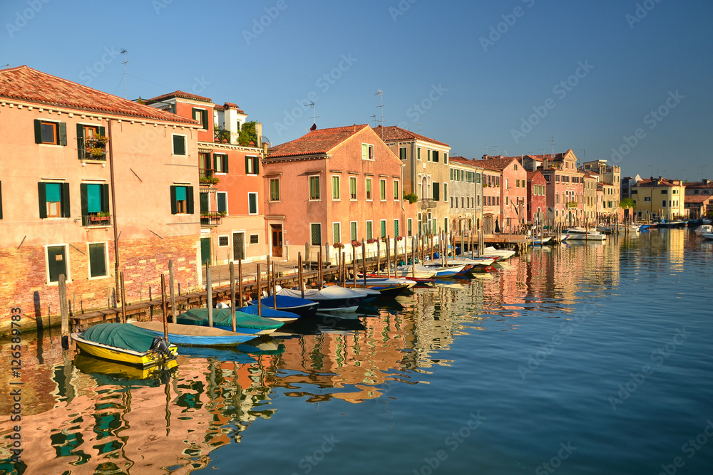 Beautiful colorful houses and boats, Venice landmark, Scenery from famous canal, Italy, Europe