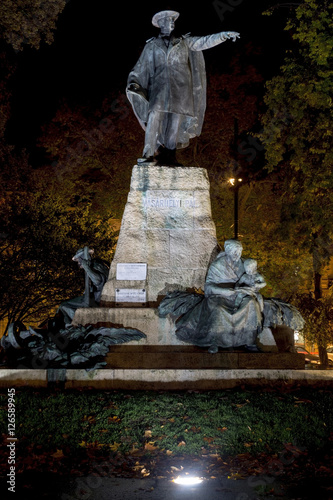 Satue at night in Szeged photo