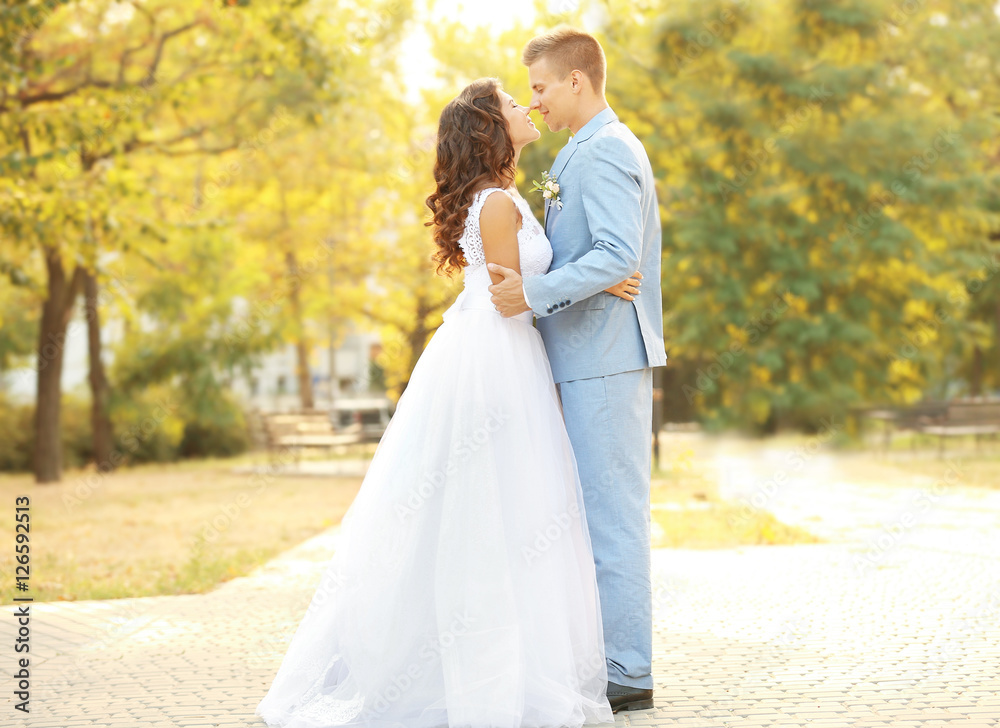 Beautiful wedding couple in green park Beautiful wedding couple in green park