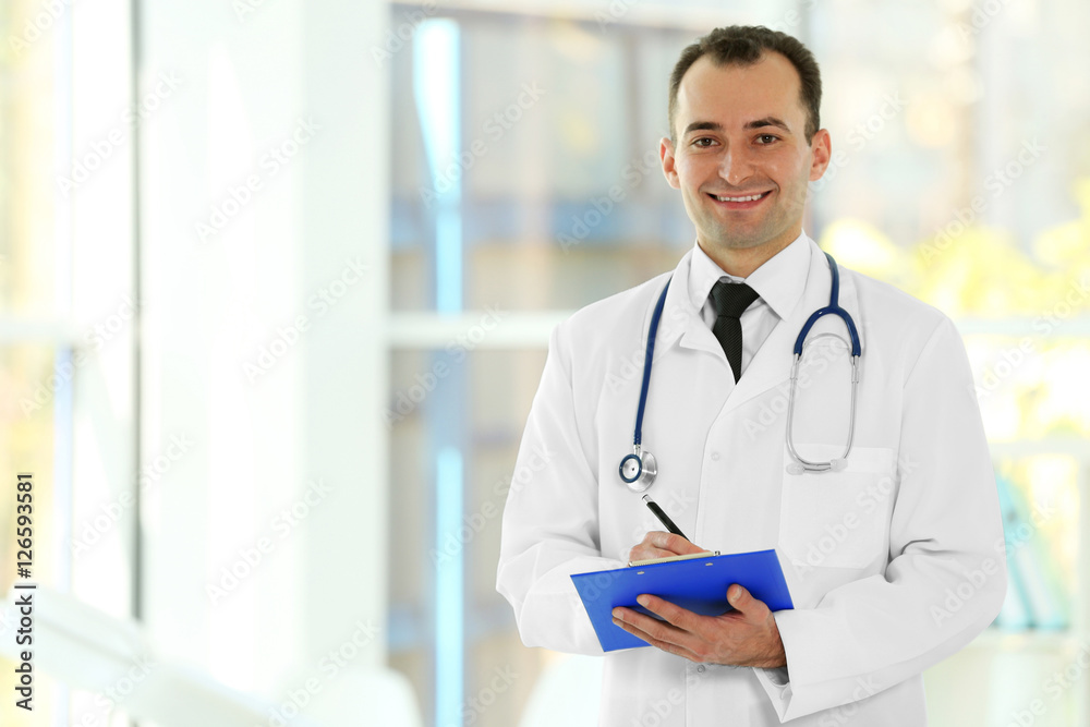 Doctor with clipboard at hospital Doctor with clipboard at hospital