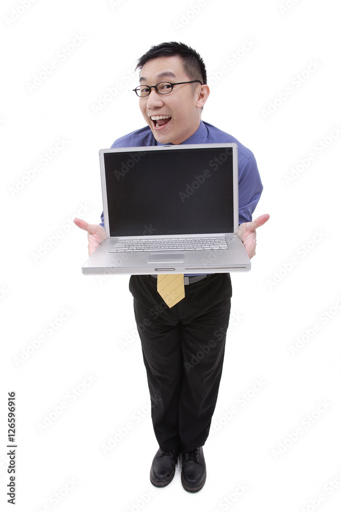 Businessman with open laptop, facing camera Businessman with open laptop, facing camera