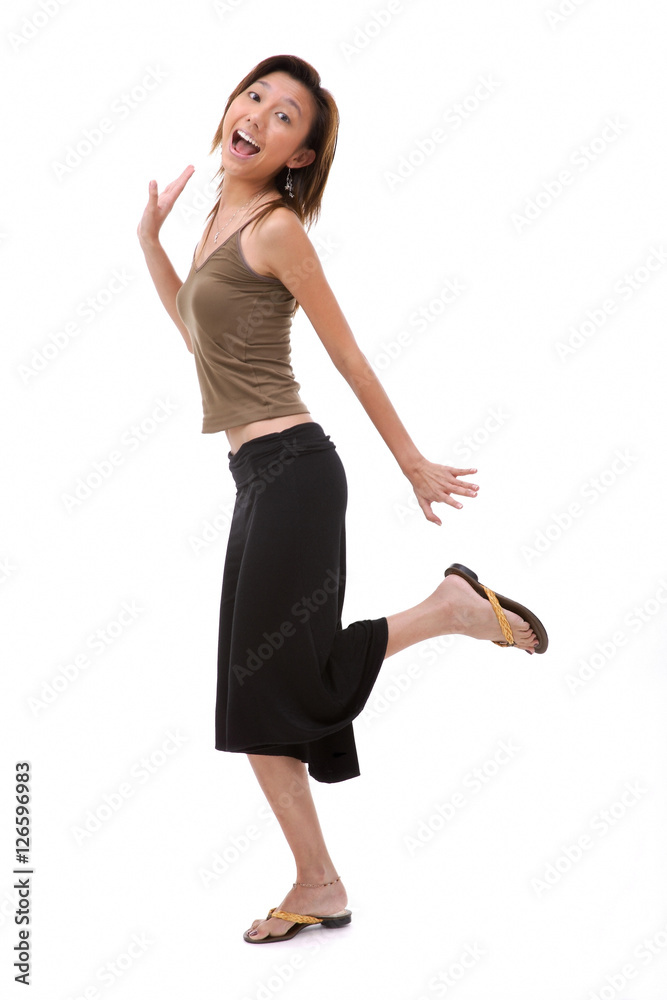 Young woman with mouth open, standing on one leg Young woman with mouth open, standing on one leg
