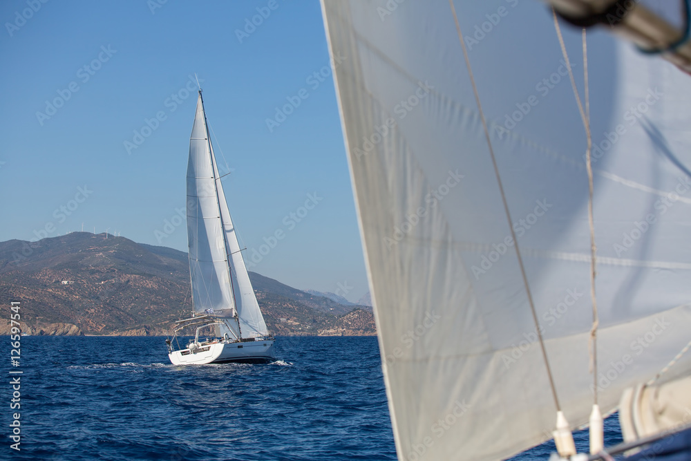 Sailboats during sailing regatta in the Sea. Luxery yachts.