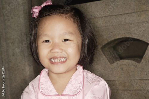 Little Chinese girl smiling