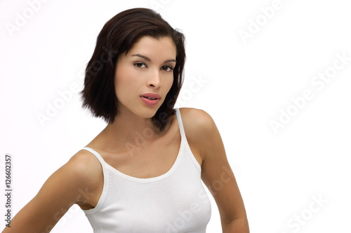 Young woman looking at camera, posing