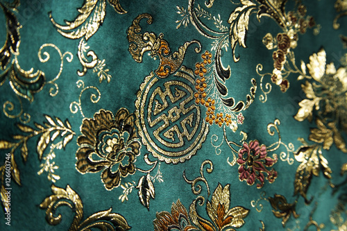 Obraz na płótnie Detail of jade green Chinese silk fabric w salonie