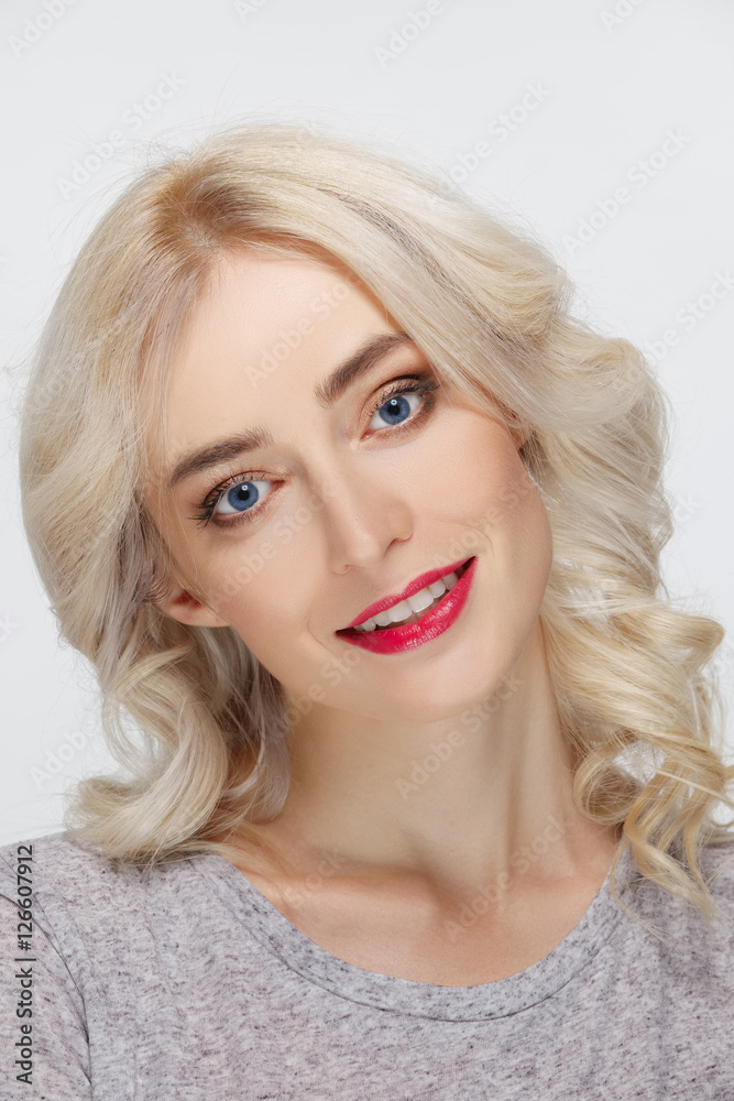 White hair fashion model with natural makeup, blue eyes and red White hair fashion model with natural makeup, blue eyes and red