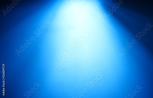Top blue ray of light bokeh background