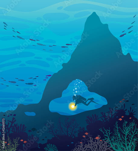 Wild marine life - underwater cave, coral reef and scuba diver.