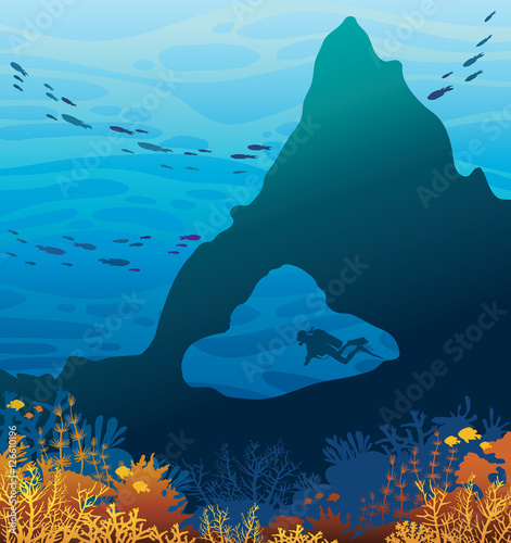Wild marine life - underwater cave, coral reef and scuba diver.