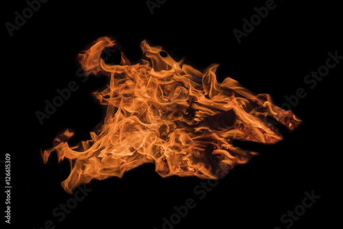 Orange flames on a black background. Isolated © watman