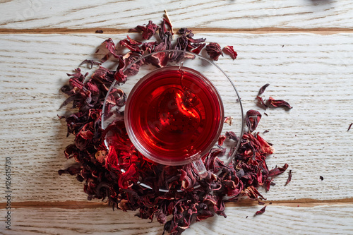Red Hibiscus tea in glass mug