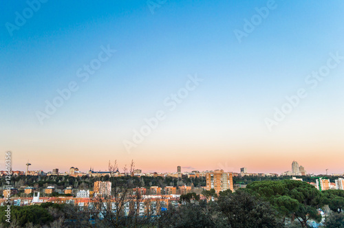 Madrid skyline cityscape at sunset time, Spain